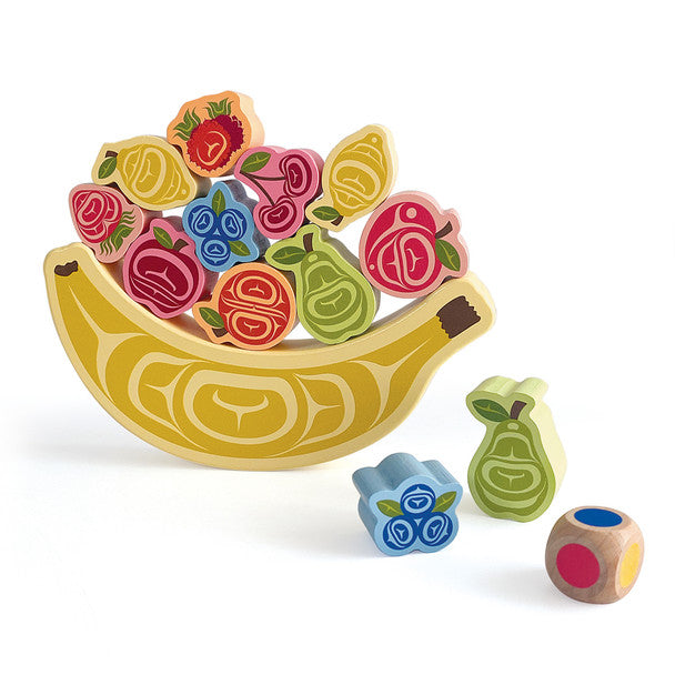 Wooden toy set with colorful fruits and vegetables on a white background