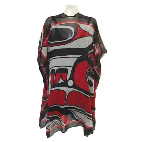 Sheer dress with red, black, and gray abstract pattern on a white background