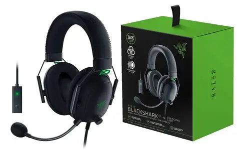 Razer Blackshark gaming headset with microphone and packaging on a white background