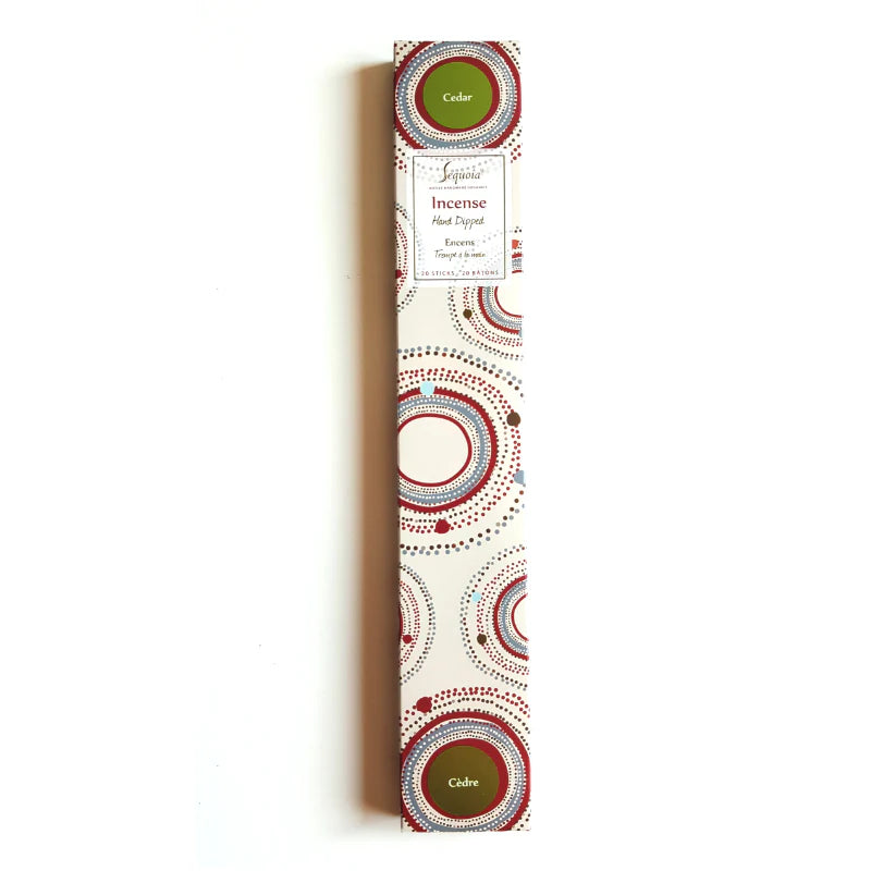 Incense stick packaging with decorative design on a white background