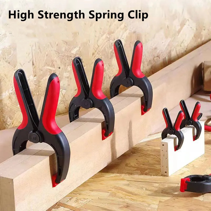 High Strength Spring Clips on a wooden surface with a neutral background