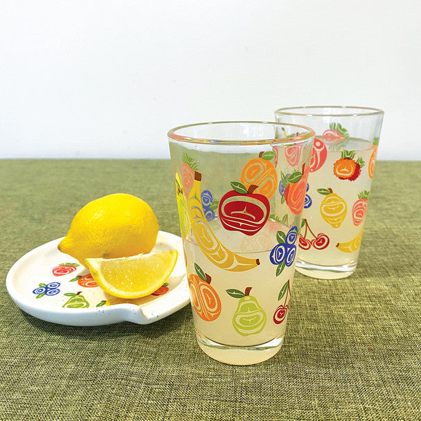 Fruit salad glass tumbler with lemonade in it