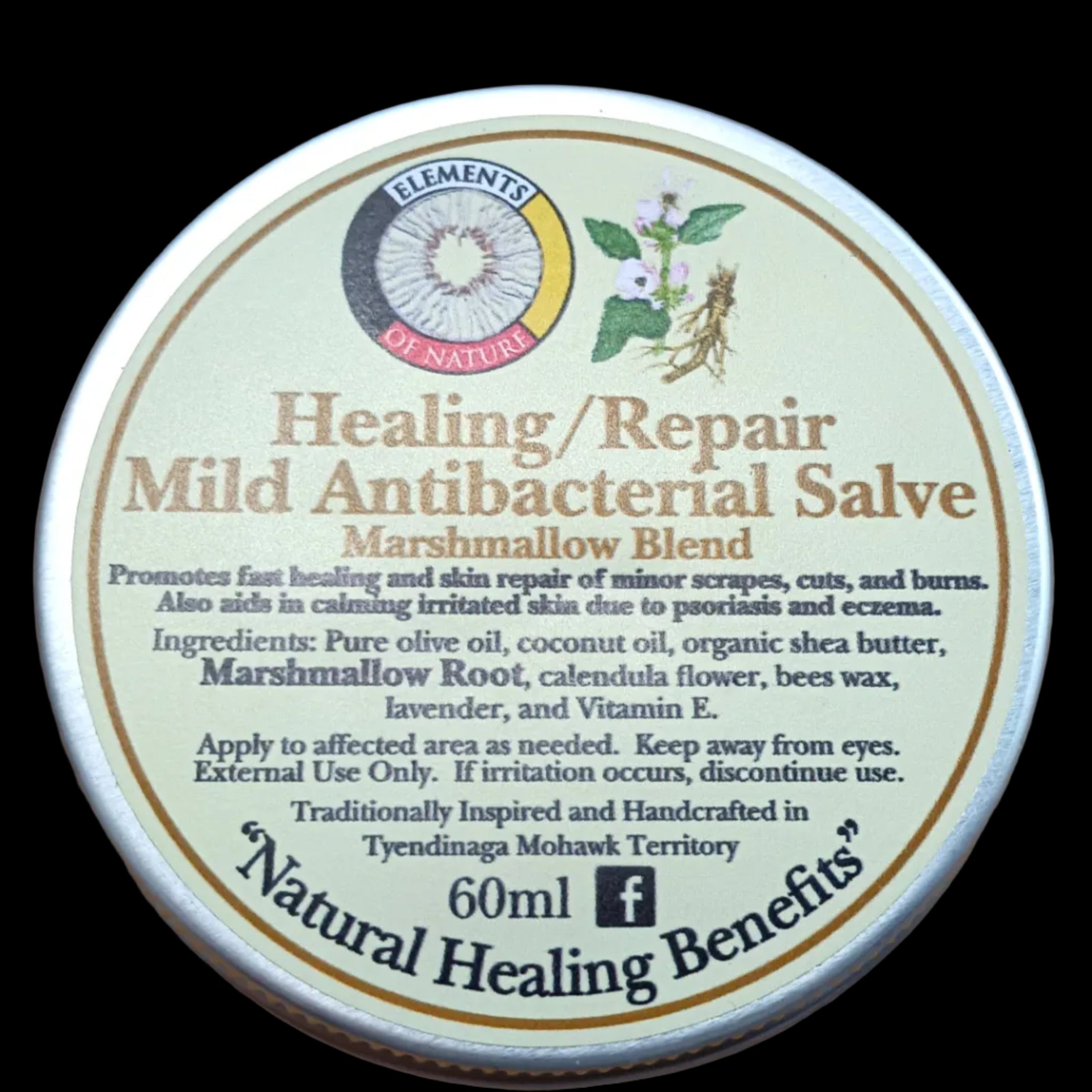 Healing/repair salve container with label on a black background