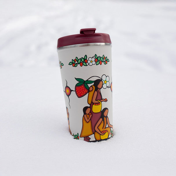 Travel mug with artistic design on a white background