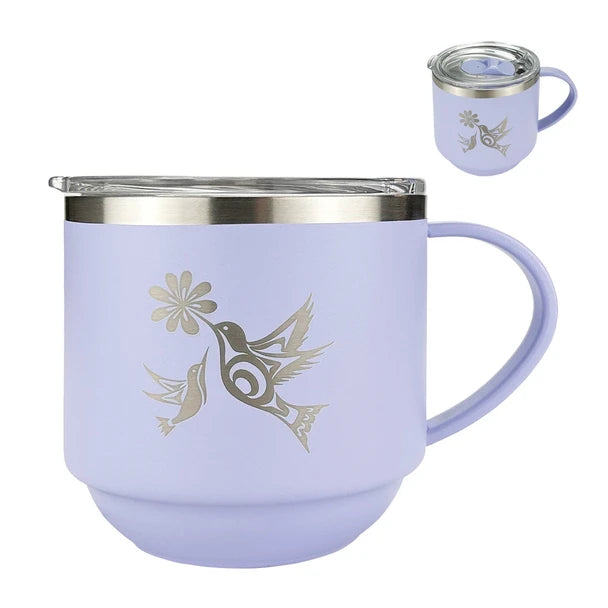 Purple mug with silver hummingbird design on a white background