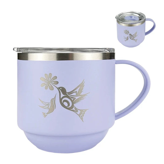 Purple mug with silver hummingbird design on a white background