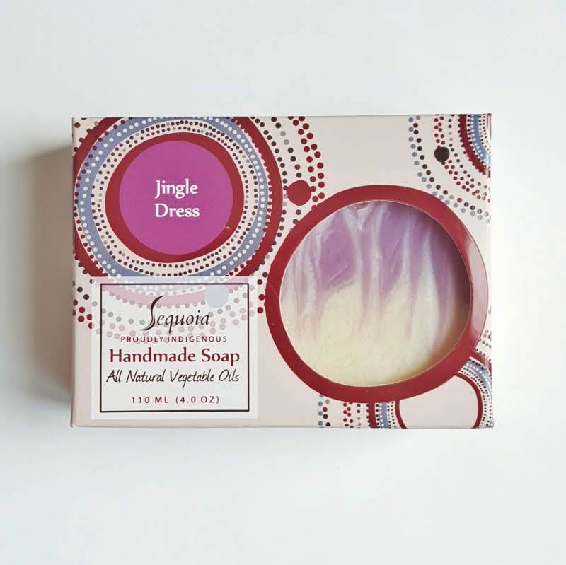 Handmade soap packaging with 'Jingle Dress' branding on a white background