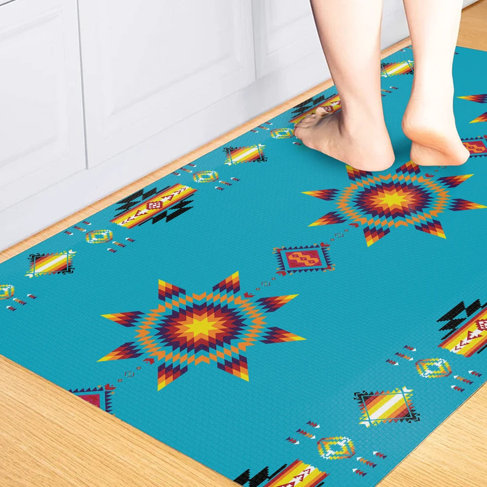 Colorful patterned rug on a wooden floor with feet stepping onto it.