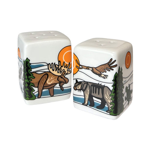 Two ceramic salt and pepper shakers with nature-themed designs on a white background