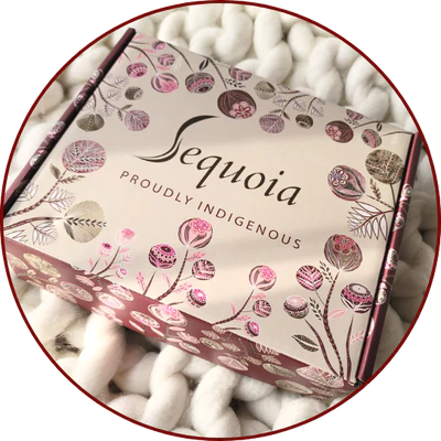 Sequoia product packaging with floral design on a white background