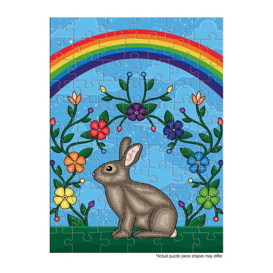 Jigsaw puzzle with a rabbit, flowers, and rainbow design on a blue background